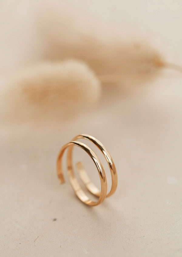 A close up look at the Wrap Ring created by Hello Adorn to look like 2 rings together, a large statement ring to add to a ring stack or wear alone!